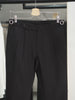 Black tapered pleated trouers