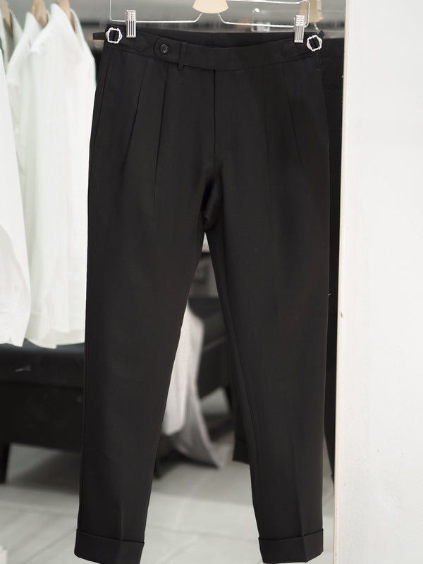 Black tapered pleated trouers