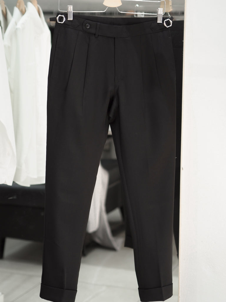 Black tapered pleated trouers