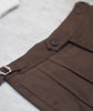 Rosewood belt with tapered trousers