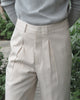 Beige reverse pleated trousers