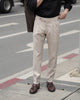 Beige Edge pleated belt trousers