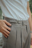 Latte belt waist pleated with pocket trousers
