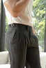 Dark grey trousers with adjustable waist