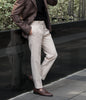 Beige Edge pleated belt trousers
