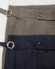 Navy Edge pleated belt trousers