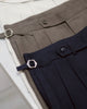 Navy Edge pleated belt trousers