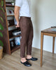 Rosewood belt with tapered trousers