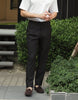 Black rafeal pleated belt trousers