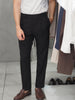 Black tapered pleated trouers