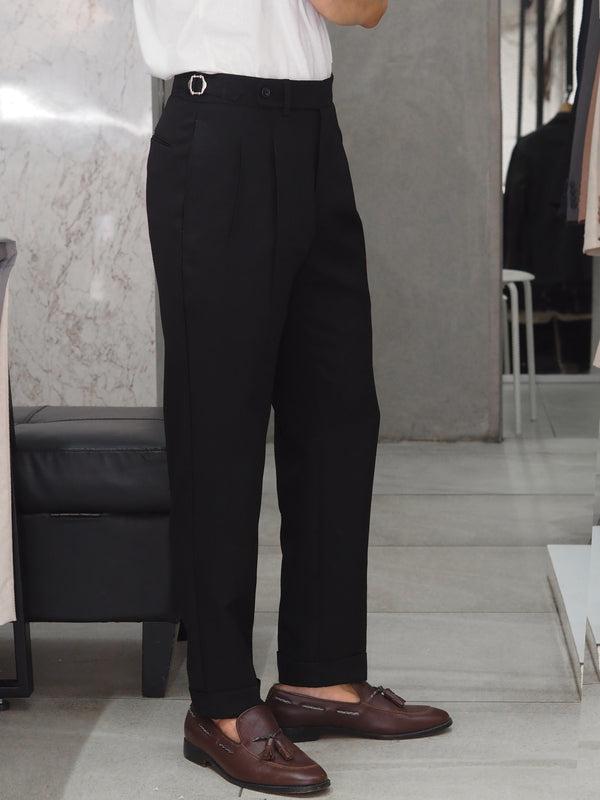 Black tapered pleated trouers