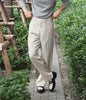 Beige reverse pleated trousers