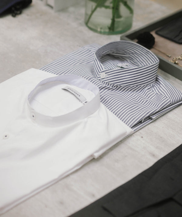 White mao with blue stripe collar shirt