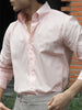 Pink button down shirt