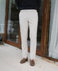 Beige trousers with side contrasting