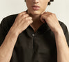 Black relaxed polo shirt